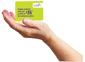 A hand holding an XTAMPZA ER copay savings card.